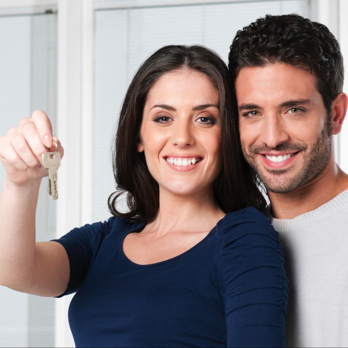 couple_holding_keys