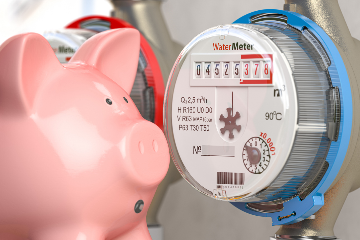 Water meter with piggy bank. Water consumption, cost of utilities and payment for water